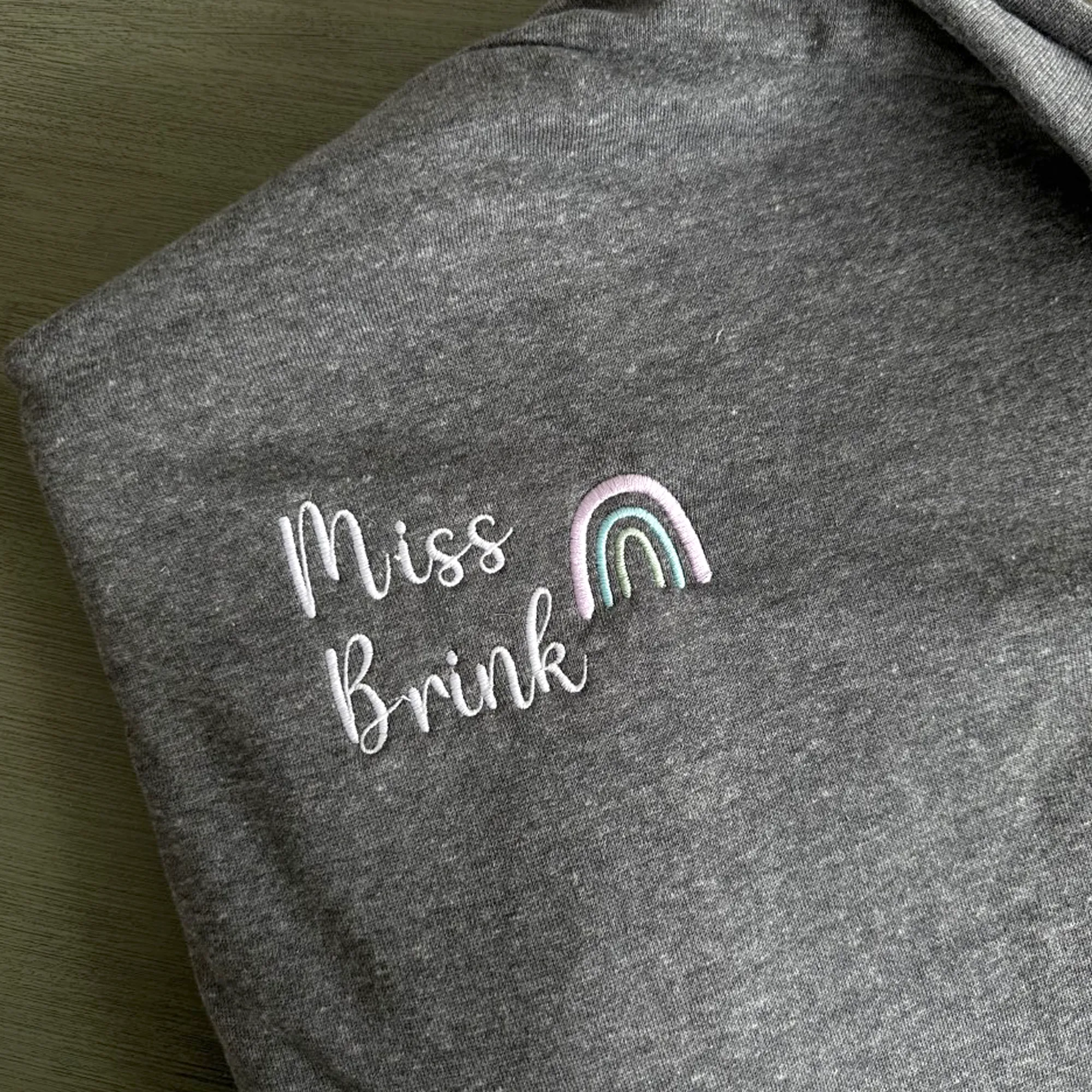Customizable Ladies Tri-Fleece Hooded Pullover for Teachers with Rainbow Design